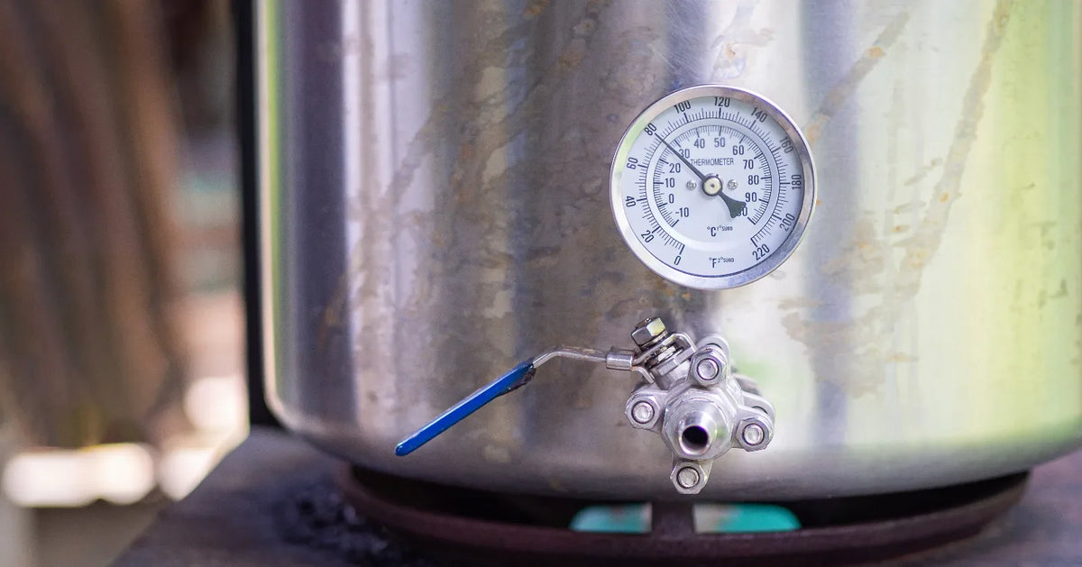 Thermometer on a brewing vessel used to monitor lager fermentation temperature