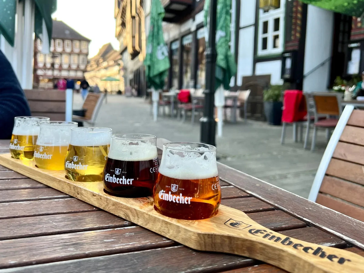 Flight of different German beer styles at a restaurant in Germany