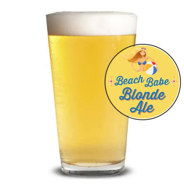 Glass of blonde ale with 'Beach Babe Blonde Ale' label on a white background