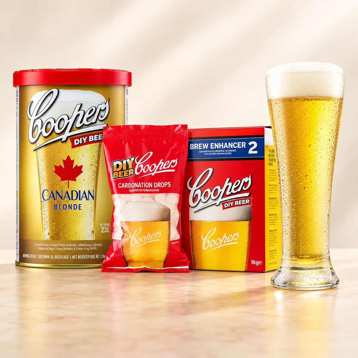 Coopers DIY Canadian Blonde 5 Gallon Refill with beer glass, carbonation drops, and Brew Enhancer 2