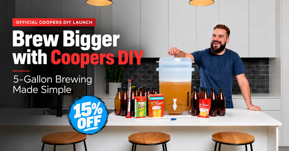 Homebrewer with Coopers DIY 5-gallon brewing kit and fermenter in a modern kitchen with promotional text for the official Coopers DIY launch and 15% off.