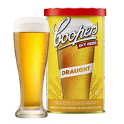 Coopers Draught Brewing Extract can with a glass of light golden draught beer