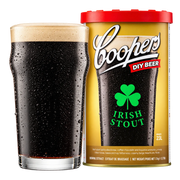Coopers Irish Stout 5-gallon brewing extract refill with a glass of dark stout
