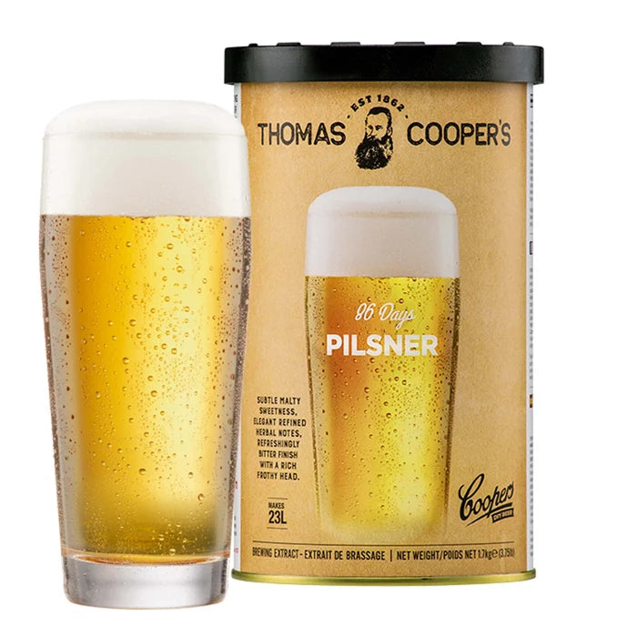 Thomas Coopers 86 Days Pilsner Brewing Extract can with a glass of crisp golden pilsner