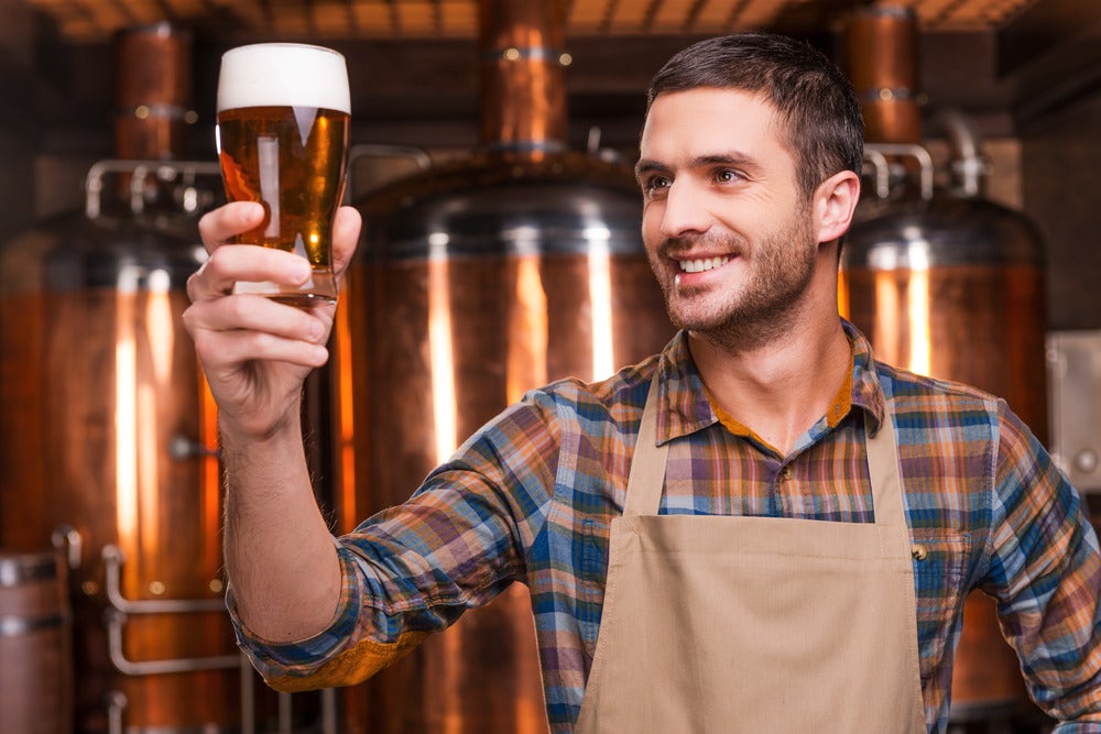 A homebrewer troubleshooting flat and overcarbonated beer